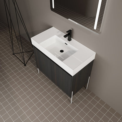 Freestanding bathroom vanity with white sink and dark wood cabinet, black faucet on Tampa Home & Garden Store