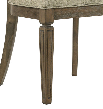 Parfield 7 Piece Dining Room Set chair leg in light brown oak with beige upholstered seat on Tampa Home & Garden Store