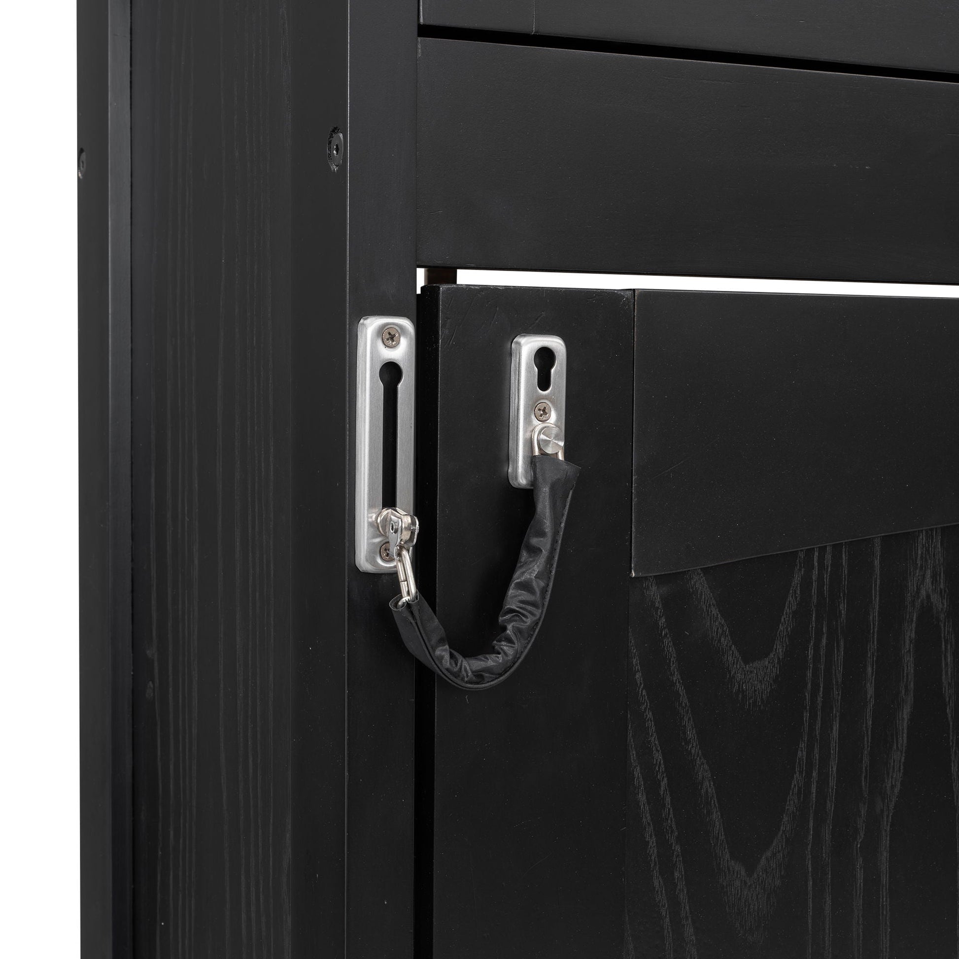 Murphy bed with storage cabinets in black wood finish showing metal hardware and cords on Tampa Home & Garden Store