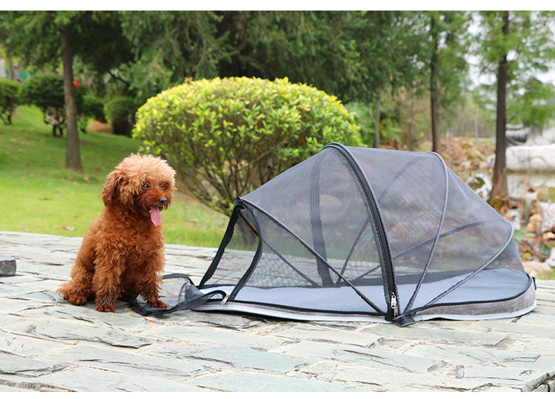 Pet folding tent travel camping gray mesh shelter with black frame beside a brown poodle on Tampa Home & Garden Store