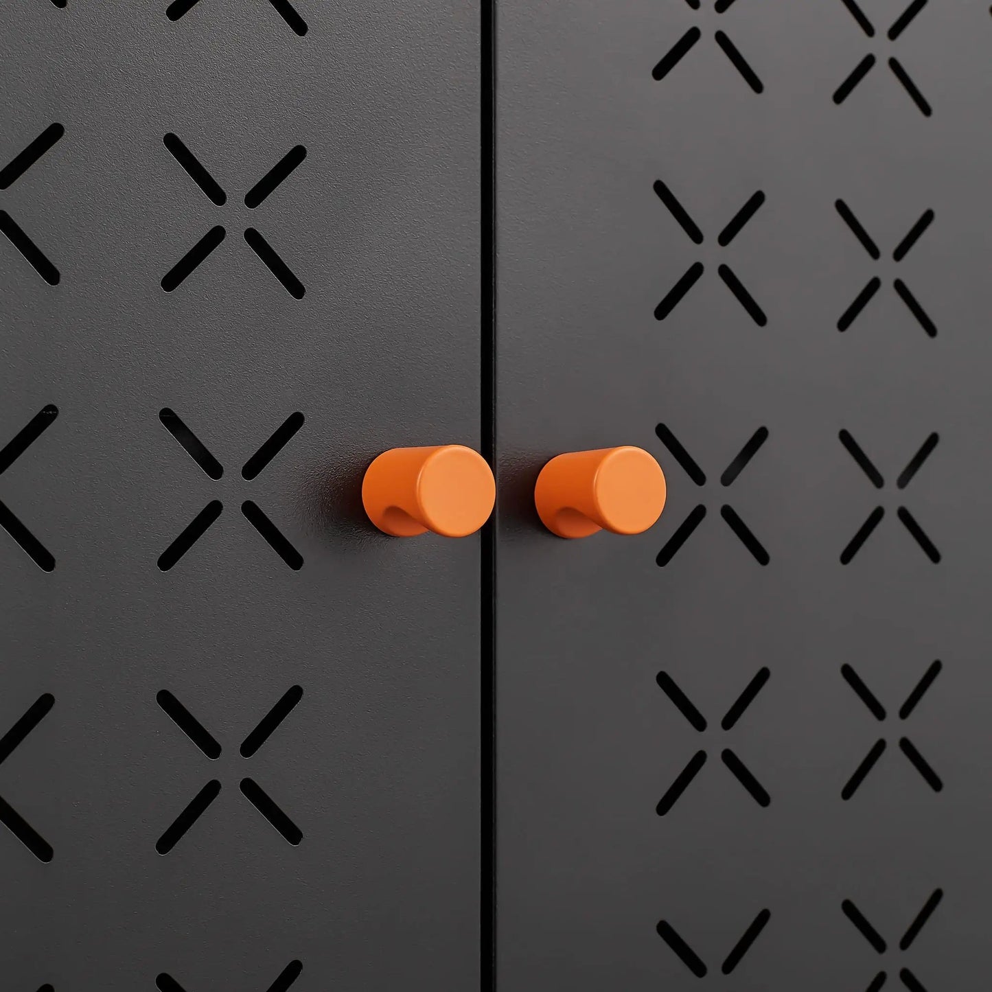 Grid double-door shoe cabinet by Unique Piece with orange knobs on dark perforated metal panels on Tampa Home & Garden Store