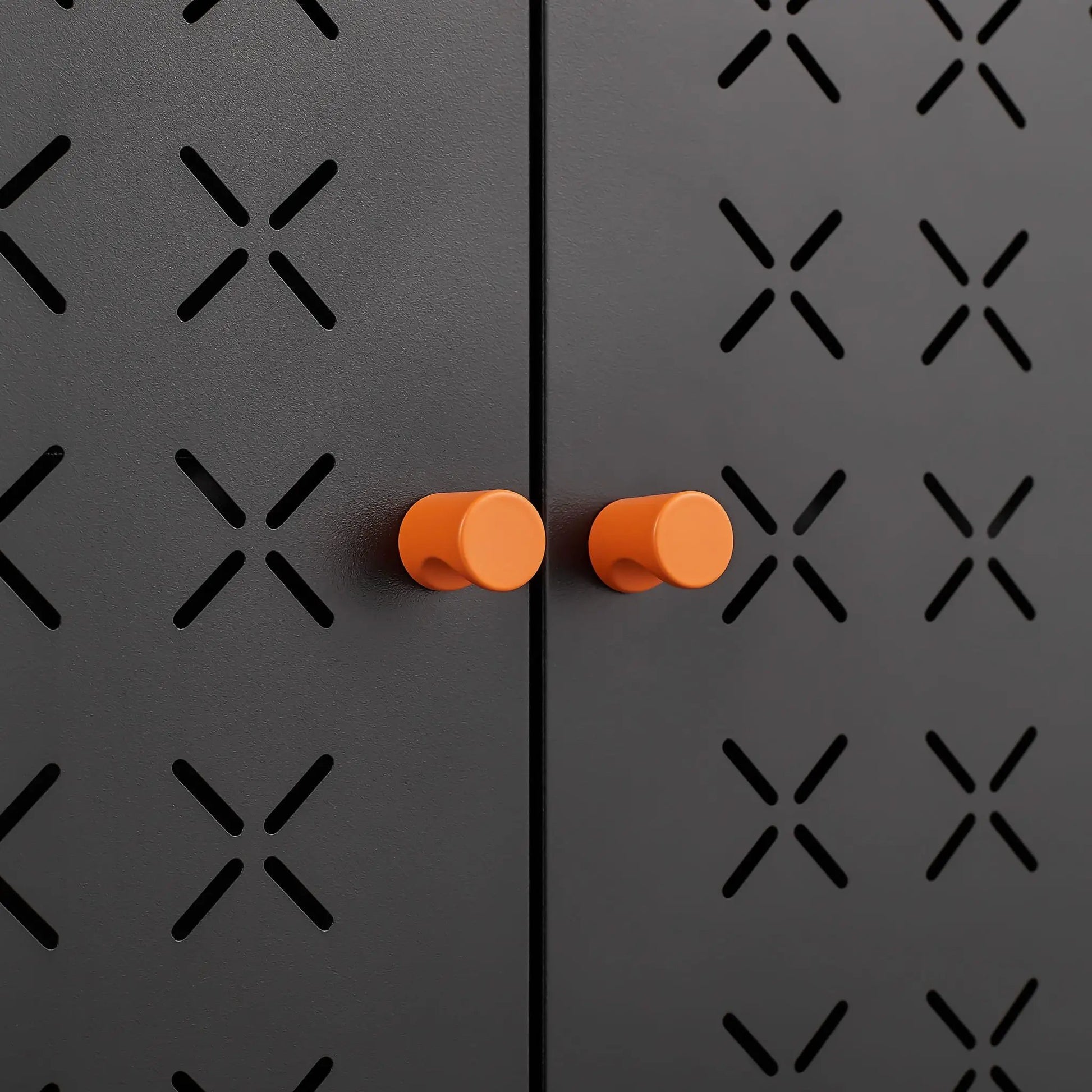 Grid double-door shoe cabinet by Unique Piece with orange knobs on dark perforated metal panels on Tampa Home & Garden Store