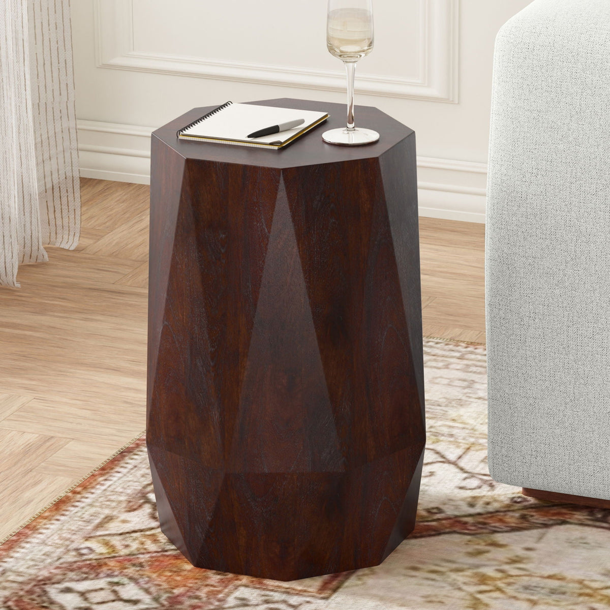 Solid acacia wood side table with sculptural faceted hexagonal base in dark brown on Tampa Home & Garden Store