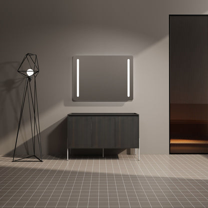 Dark brown freestanding vanity with soft-close doors and two panels beneath backlit mirror on Tampa Home & Garden Store