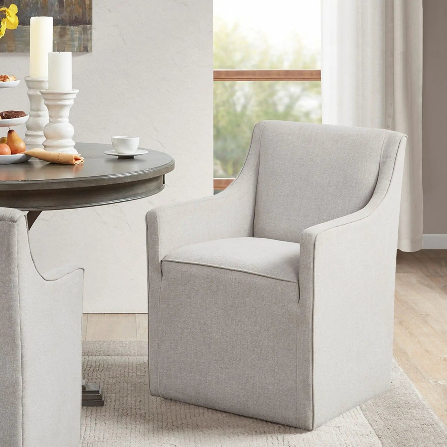 Pair of traditional skirted dining arm chairs in light gray fabric by Unique Piece Furniture on Tampa Home & Garden Store