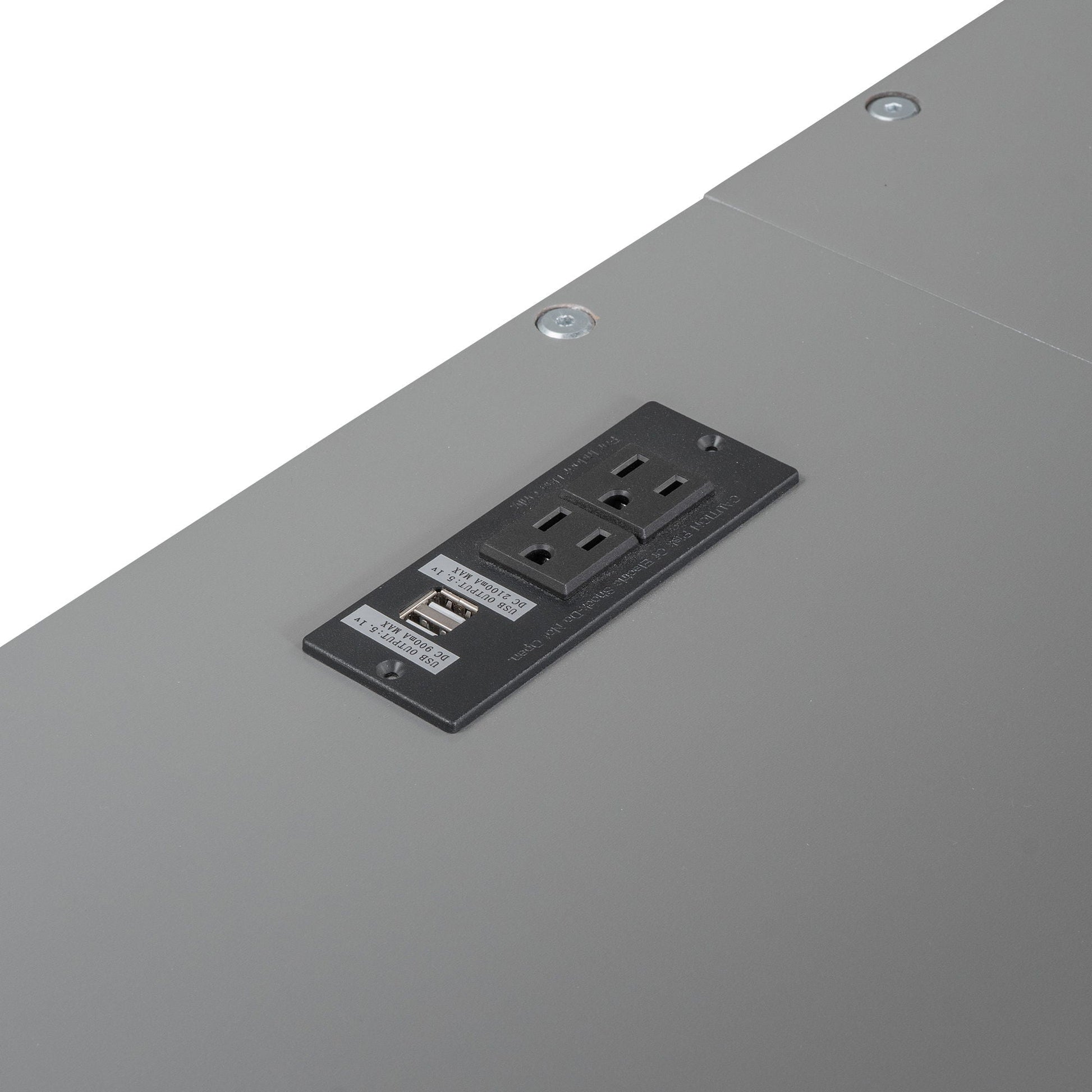 Loft bed charging station panel on gray metal frame with black multi-outlet power strip on Tampa Home & Garden Store