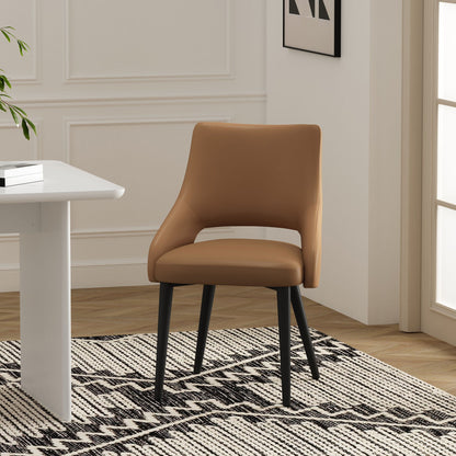 Tremont dining chair with steel frame in tan faux leather and black legs by HouseOfZazla on Tampa Home & Garden Store