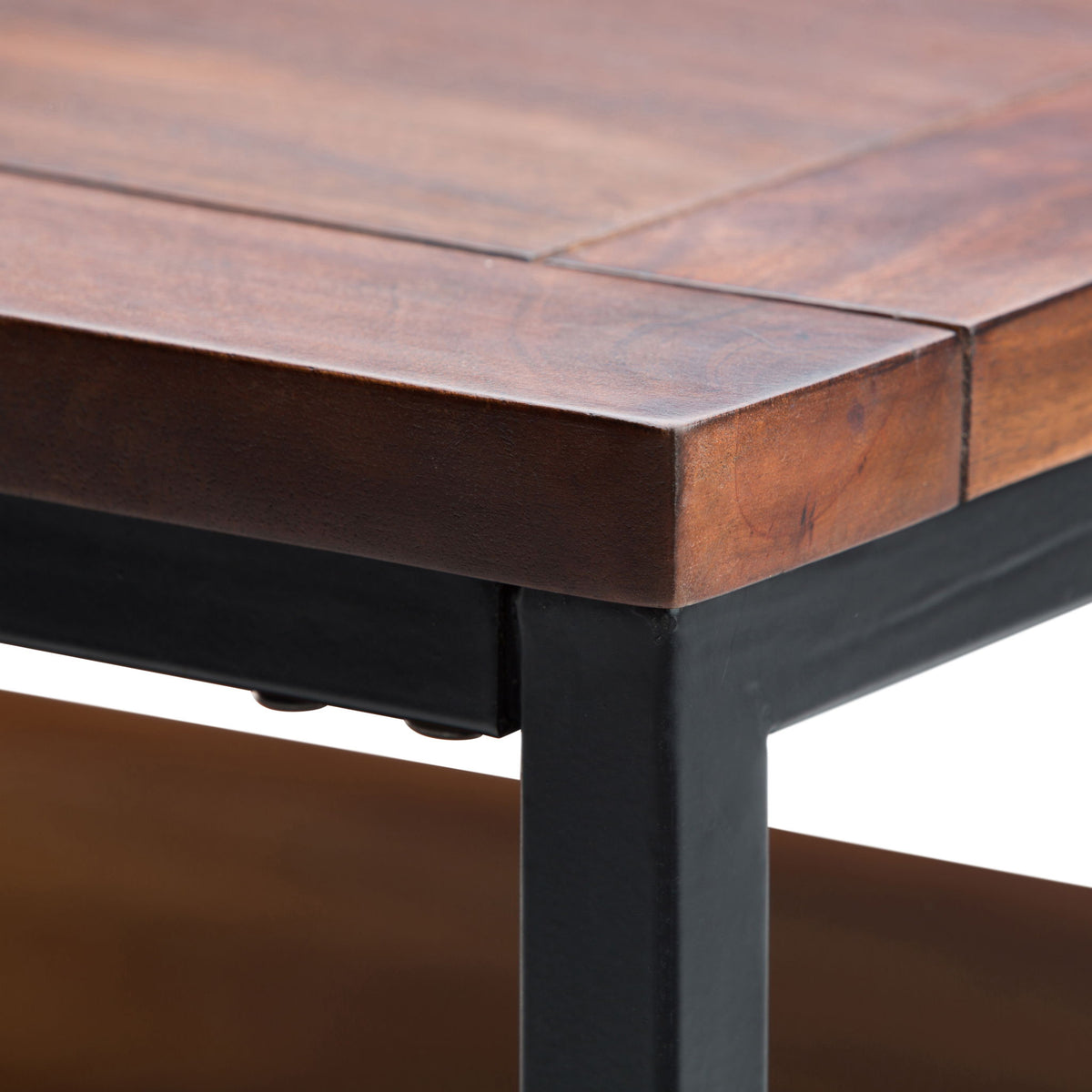 Handcrafted mango wood coffee table with black metal legs and clean edge details on Tampa Home & Garden Store