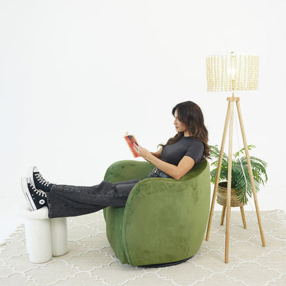 Green velvet swivel armchair by HouseOfZazla with 360° rotation on Tampa Home & Garden Store