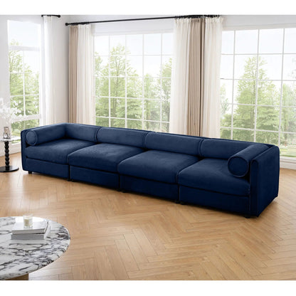 Blue velvet stationary sofa with storage seat and cylindrical backrest bolsters on Tampa Home & Garden Store