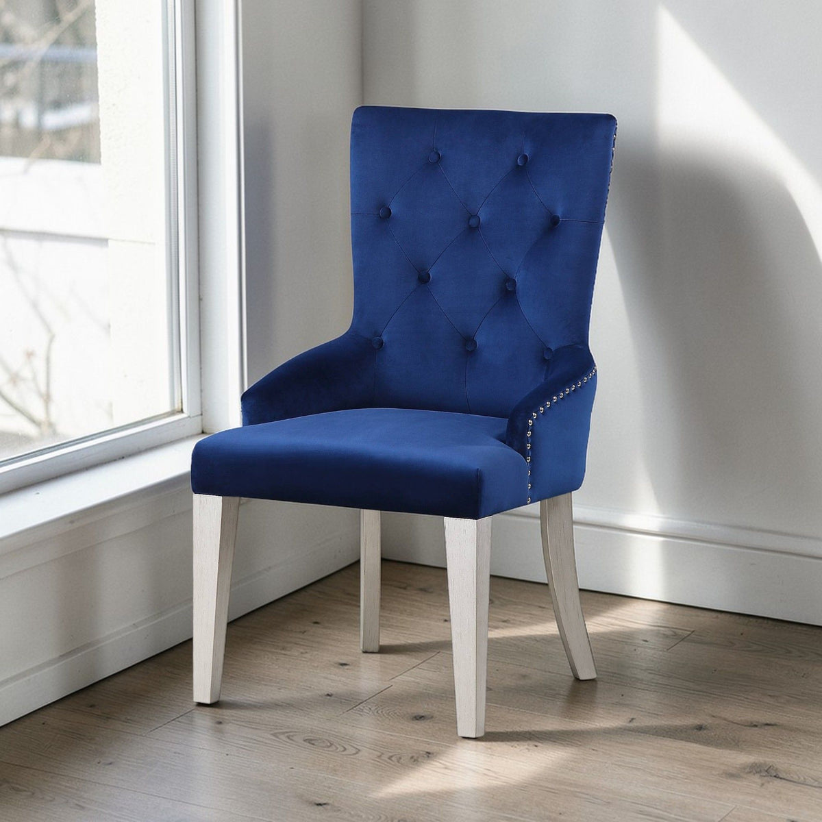 Blue Varian high-back side chair with tufted upholstery, nailhead trim, light wood legs on Tampa Home & Garden Store
