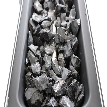 Outdoor Fire Pit Table lava rocks in a black steel fire pit channel on Tampa Home & Garden Store