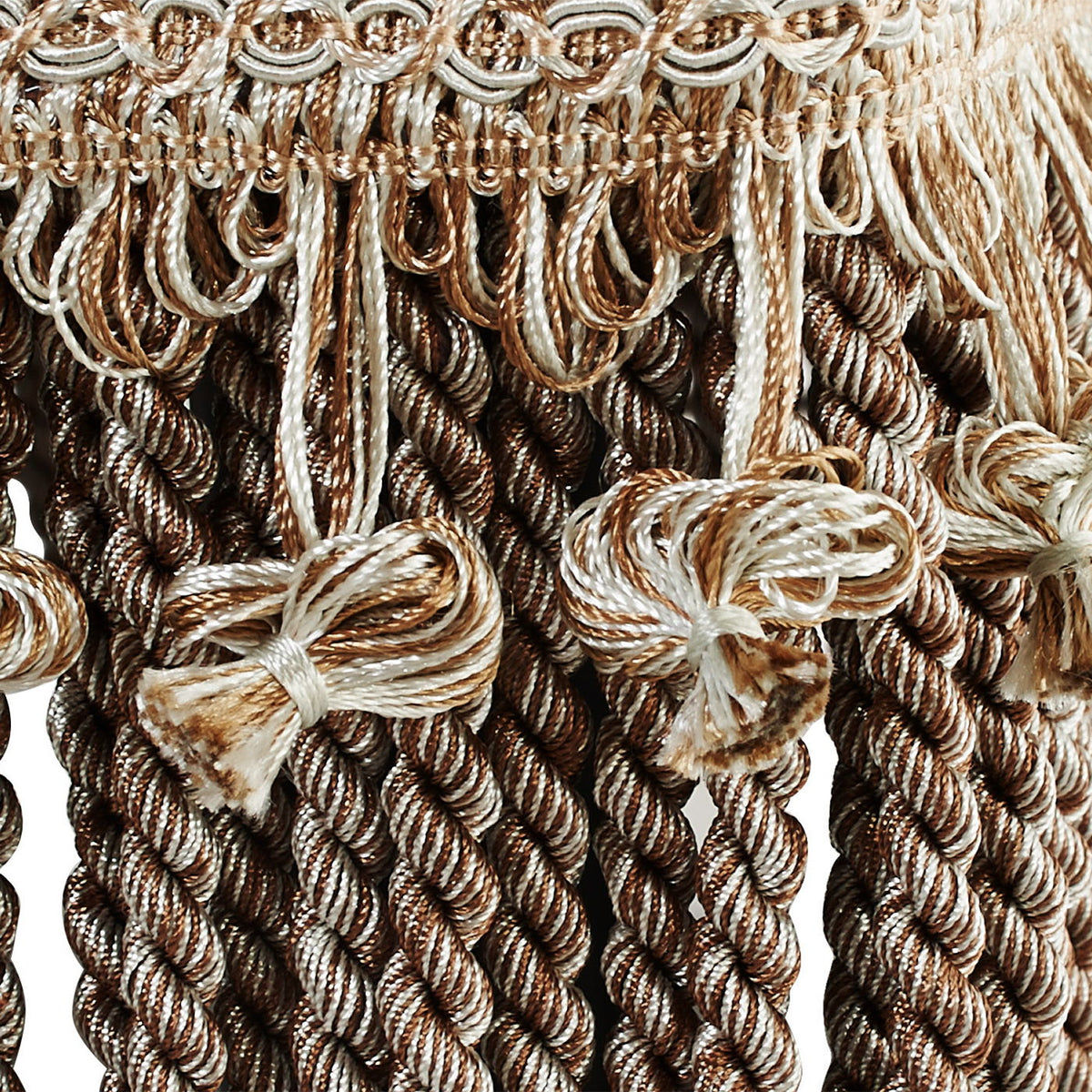 Handcrafted accent footstool ottoman fringe tassels in brown and white rope cords on Tampa Home & Garden Store