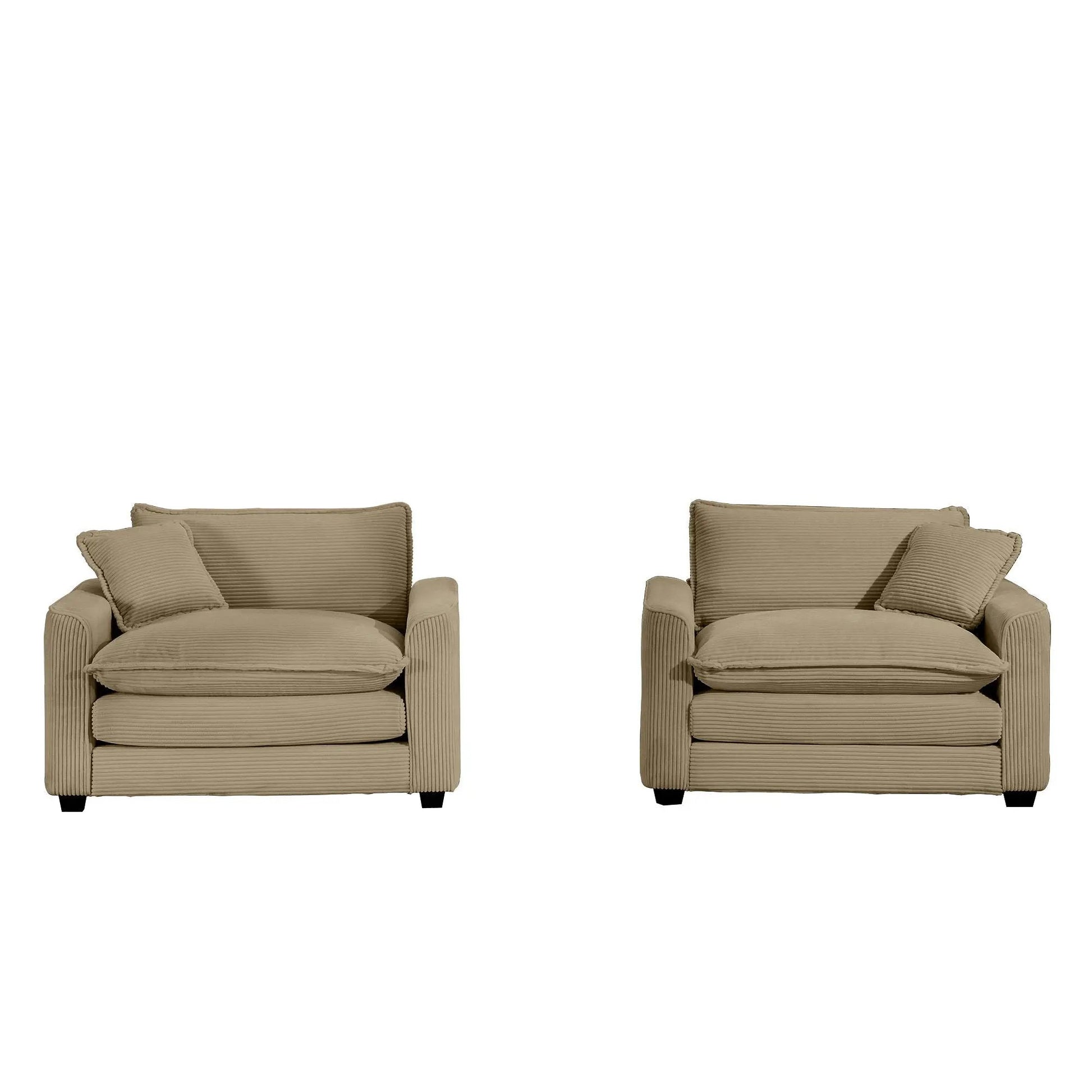 Pair of beige fabric arm chairs with deep seats and pillows on Tampa Home & Garden Store