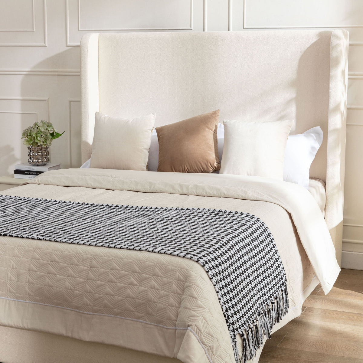 Harper tall headboard upholstered bed in cream fabric by HouseOfZazla with neutral pillows on Tampa Home & Garden Store