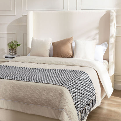 Harper tall headboard upholstered bed in cream fabric by HouseOfZazla with neutral pillows on Tampa Home & Garden Store
