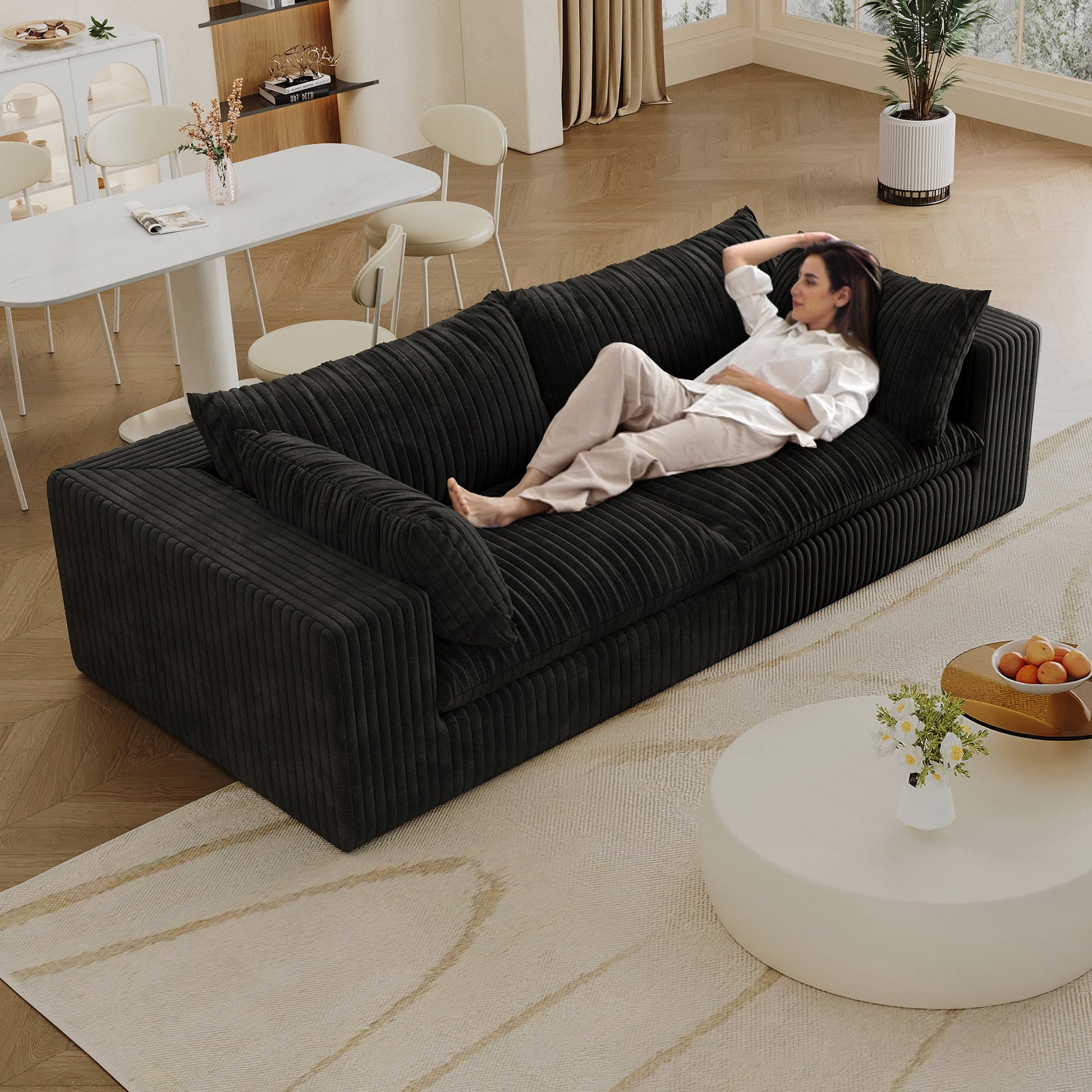 Y137 modular black corduroy sofa by HouseOfZazla in a bright living room on Tampa Home & Garden Store