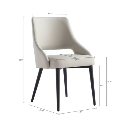 Tremont dining chair with steel frame, beige upholstery, curved back, black legs on Tampa Home & Garden Store