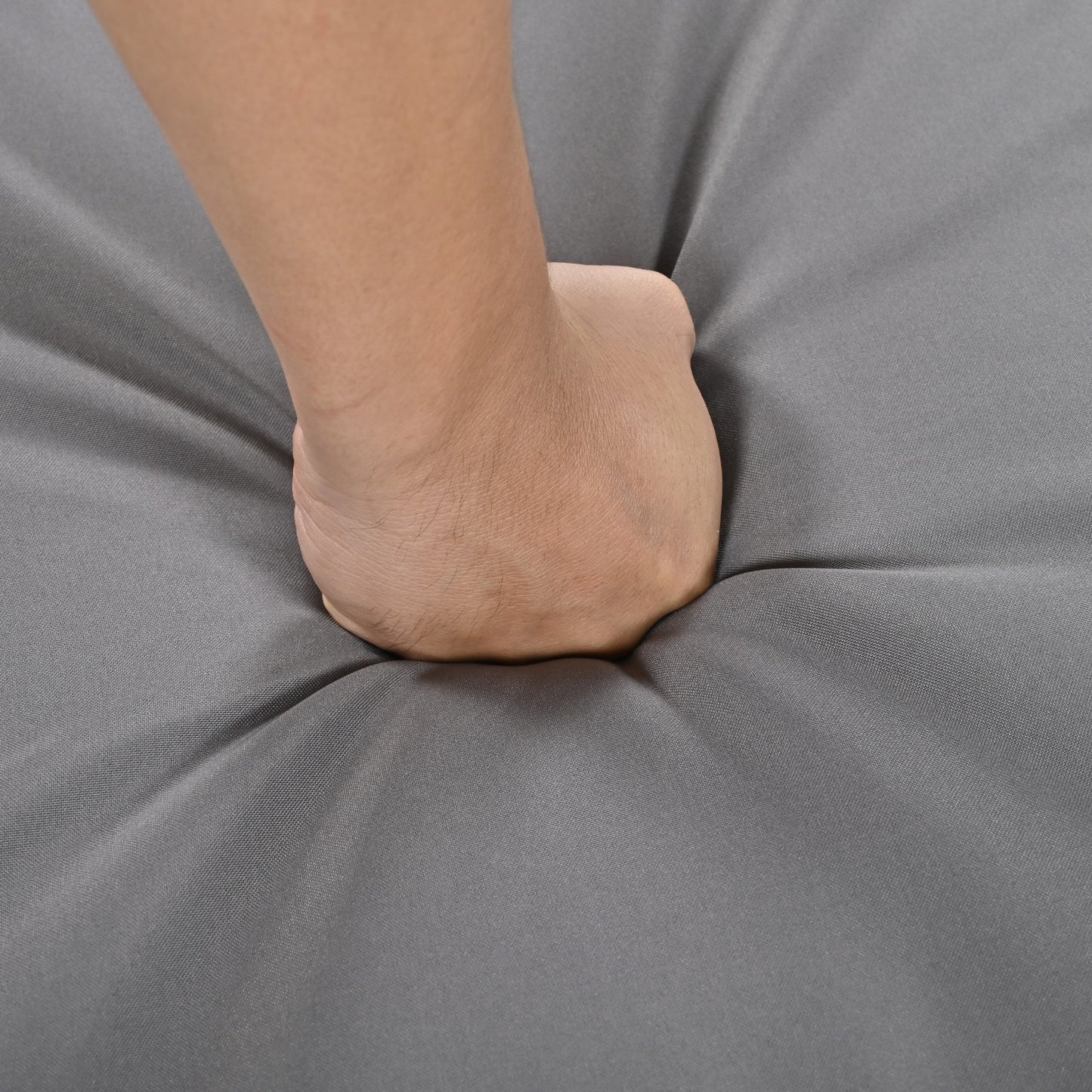 U_Style HouseOfZazla outdoor furniture close-up arm resting on gray fabric backdrop on Tampa Home & Garden Store