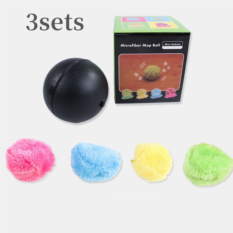 Magic Roller Ball toy set with black rolling ball and 4 plush pom-poms pink blue yellow green on Tampa Home & Garden Store