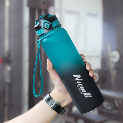 Stevvex stainless steel vacuum insulated water bottle gradient teal to black with teal lanyard on Tampa Home & Garden Store