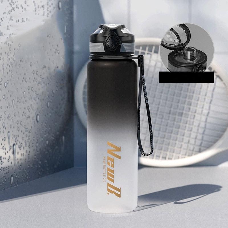 Stevvex stainless steel vacuum insulated sport water bottle with black-white gradient and strap on Tampa Home & Garden Store