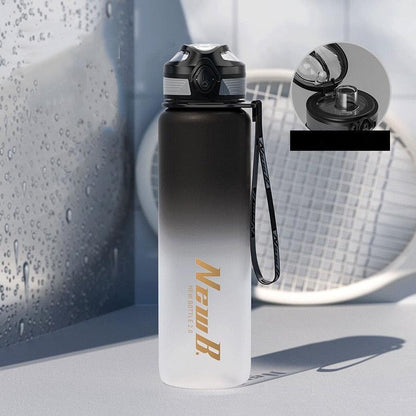 Stevvex stainless steel vacuum insulated sport water bottle with black-white gradient and strap on Tampa Home & Garden Store