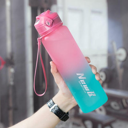 Stevvex gradient pink to teal water bottle, pink strap, stainless steel vacuum insulated 650ml on Tampa Home & Garden Store