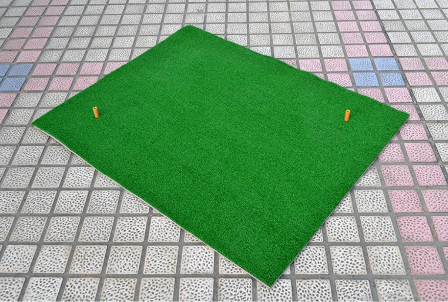 Golf practice turf mat with two orange stakes for outdoor training on Tampa Home & Garden Store