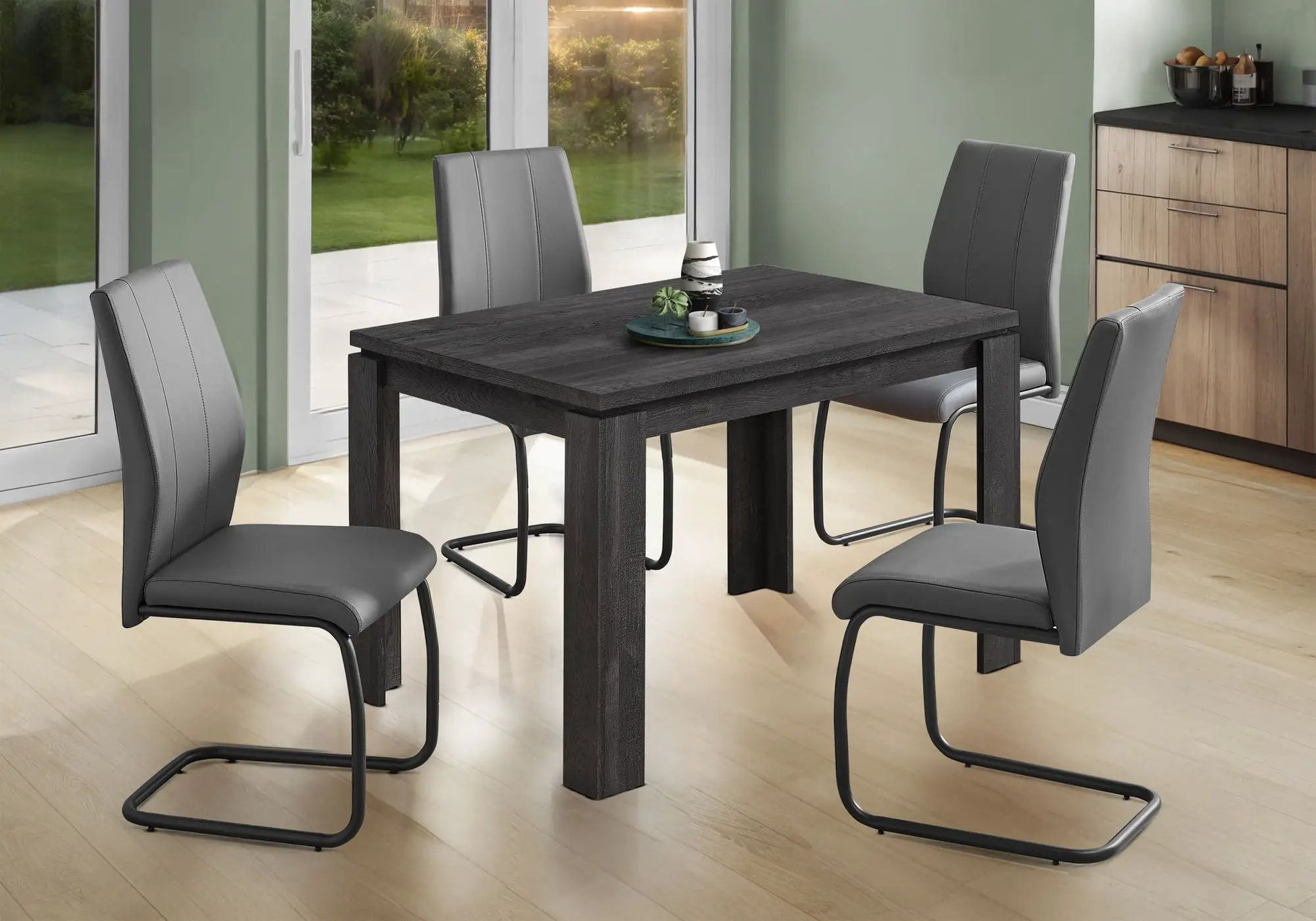 Rectangular dining table in dark wood with four gray upholstered chairs by Unique Piece Furniture on Tampa Home & Garden Store