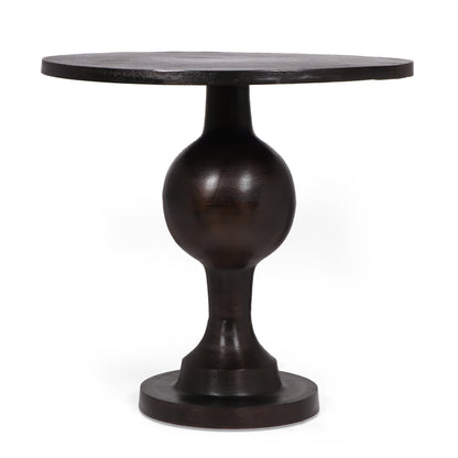 Round dark wood dining table with pedestal base on Tampa Home & Garden Store
