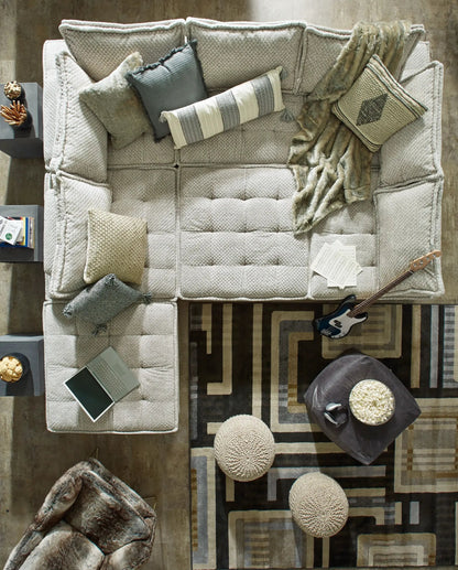Bales Sectional Sofa by Unique Piece Furniture in light beige woven fabric with textured cushions on Tampa Home & Garden Store