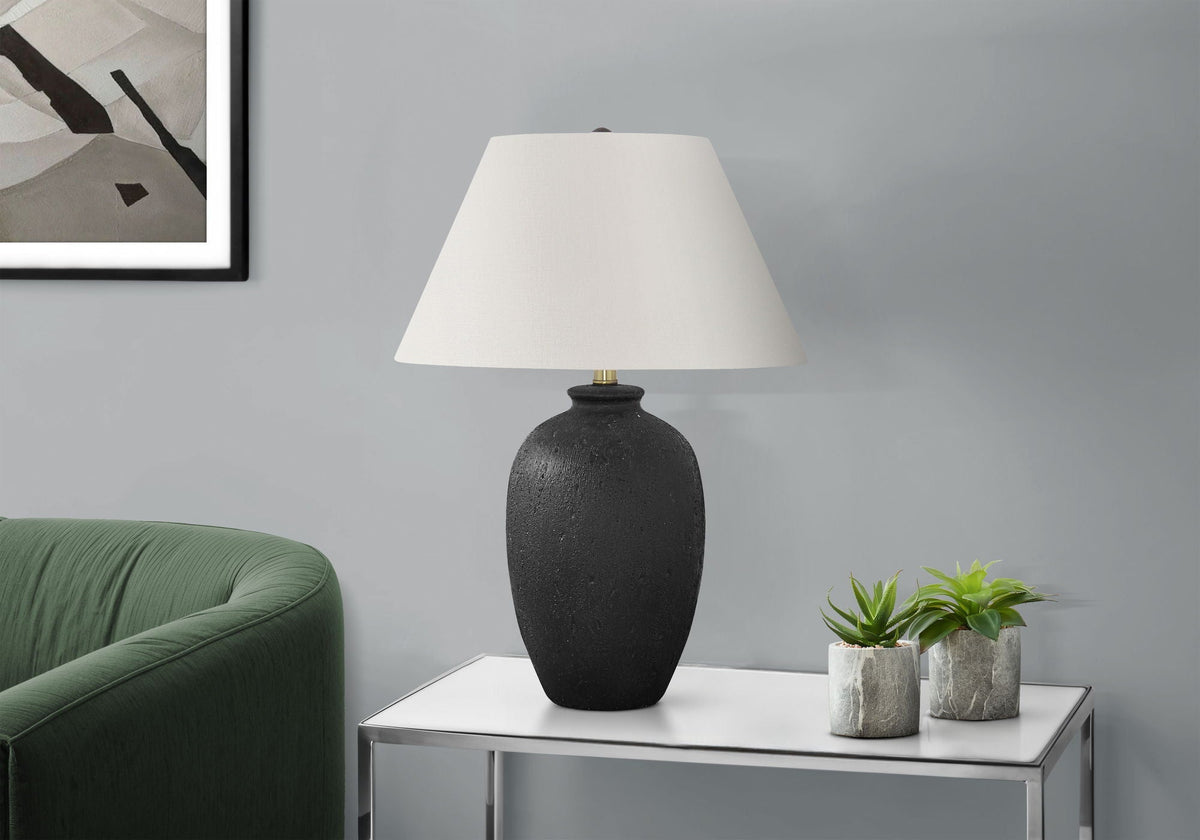 Table lamp with black ceramic base and white shade; two succulents on glass side table on Tampa Home & Garden Store