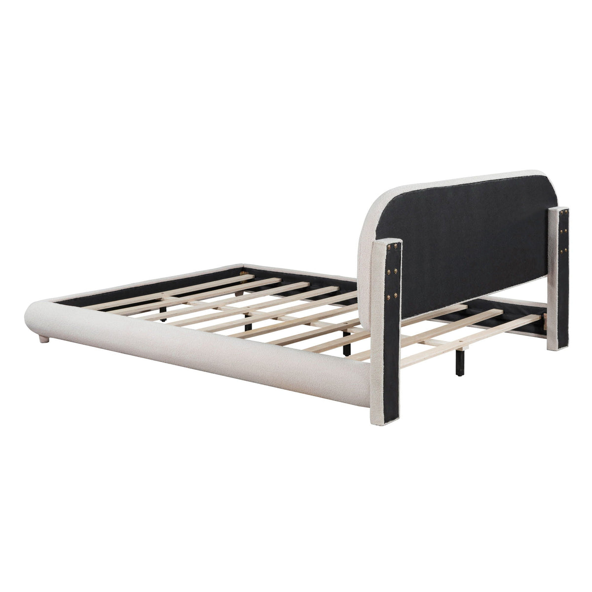 Upholstered platform bed with thick light-gray frame and curved dark-gray headboard panels, exposed wooden slats on Tampa Home & Garden Store