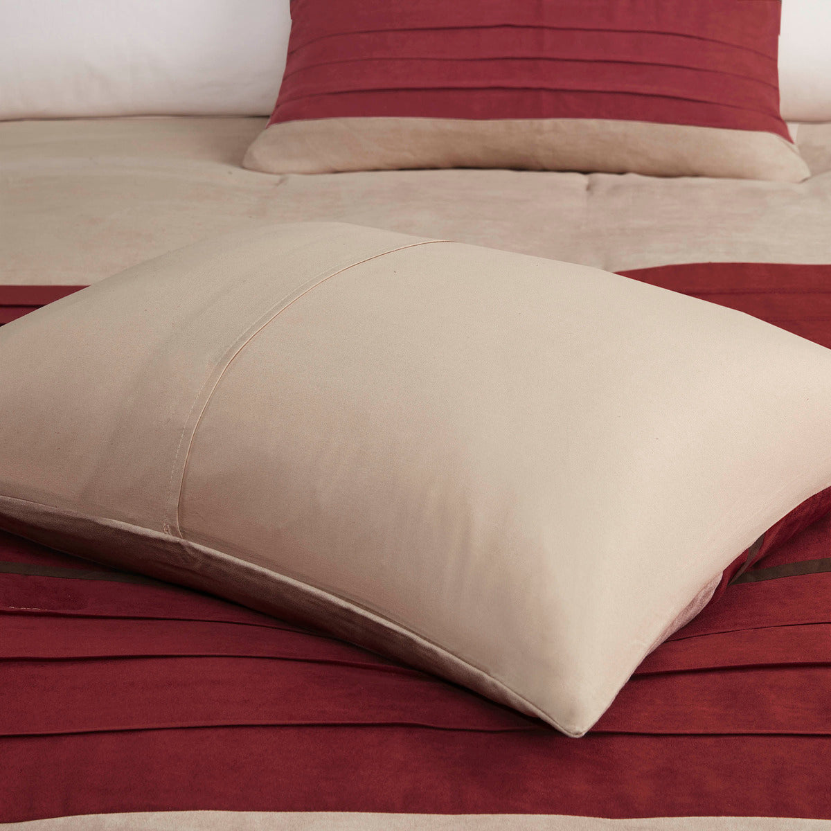 7 PC Pieced Faux Suede Comforter Set Red Cal King on beige bed with beige decorative pillow on Tampa Home & Garden Store