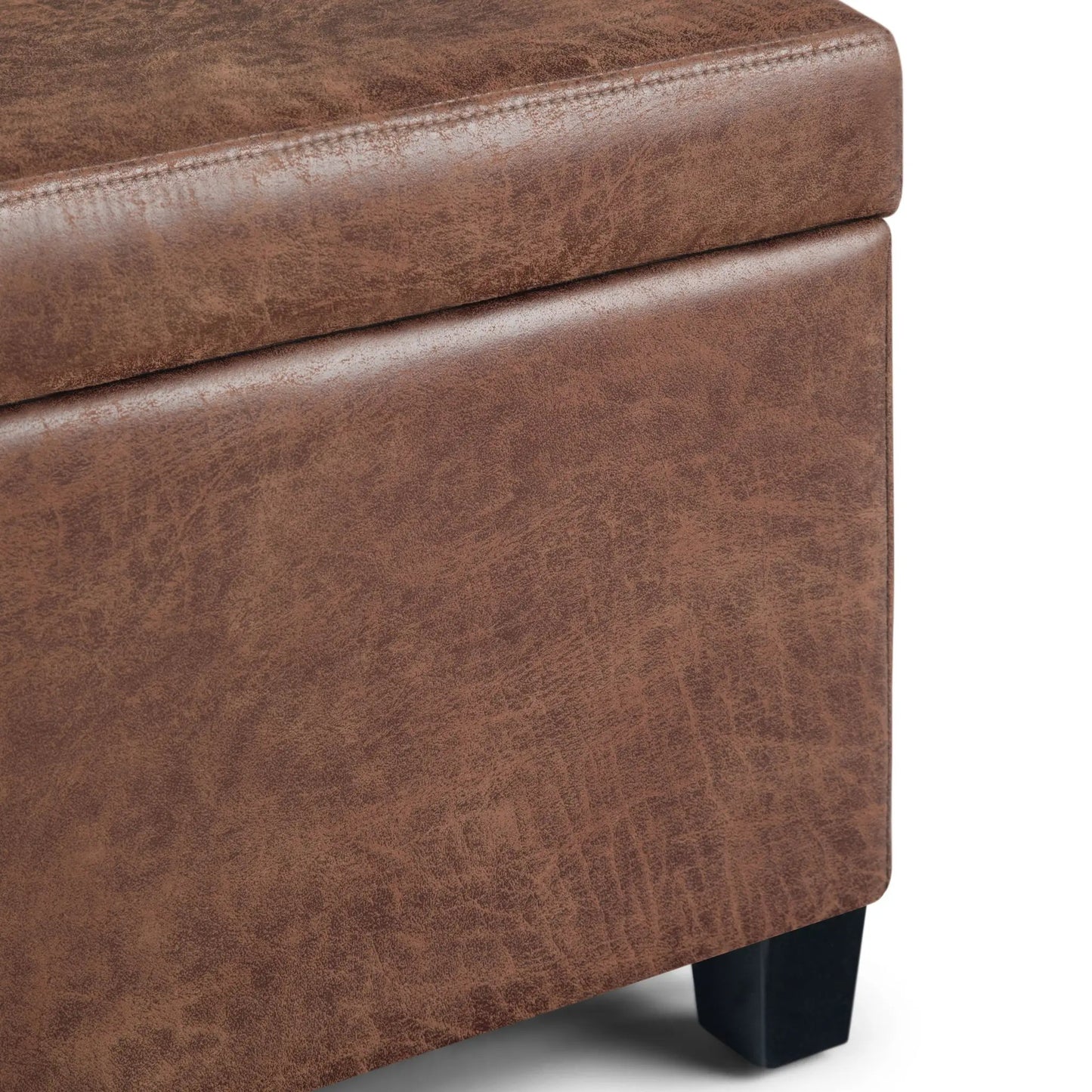Avalon storage ottoman bench in brown distressed leather-look upholstery with black legs on Tampa Home & Garden Store