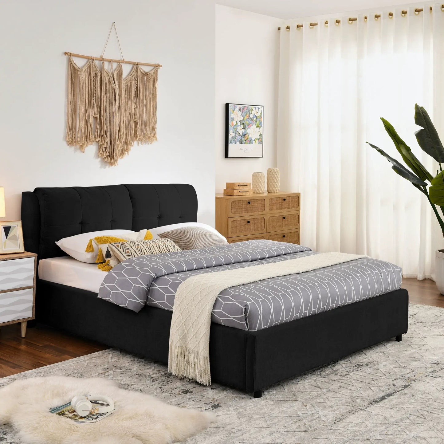 Storage upholstered hydraulic platform bed with integrated headboard in black fabric; gray geometric bedding on Tampa Home & Garden Store