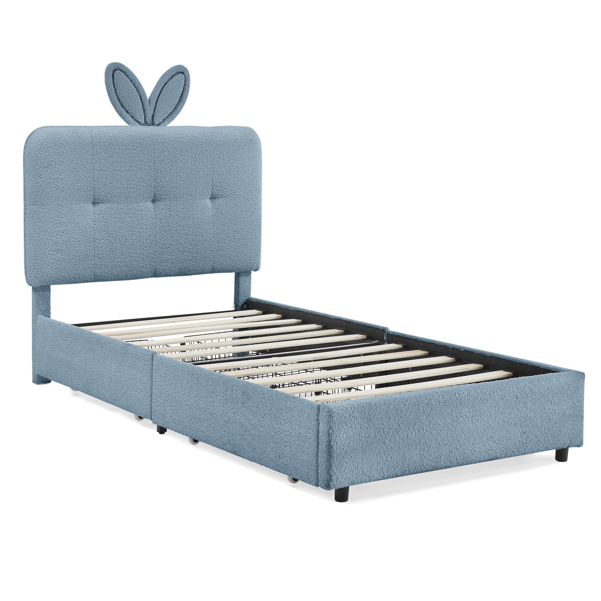 Twin size kids upholstered bed with oversized rabbit-ear headboard in blue fabric, slatted base on Tampa Home & Garden Store