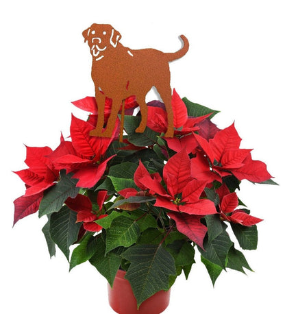 Labrador Retriever plant stake in rust-colored metal by Rustica Ornamentals atop poinsettia on Tampa Home & Garden Store