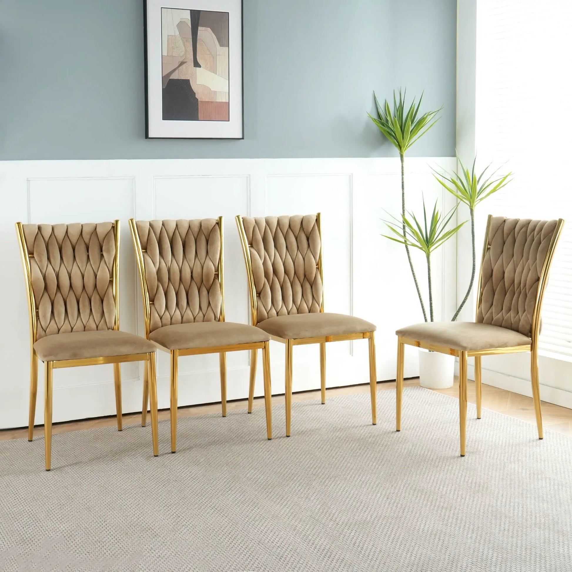 Modern dining chairs, six beige tufted with gold legs, in a light gray room on Tampa Home & Garden Store