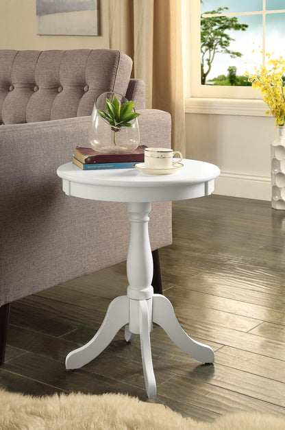 Alger white accent table with round top and turned pedestal base beside a beige tufted sofa on Tampa Home & Garden Store