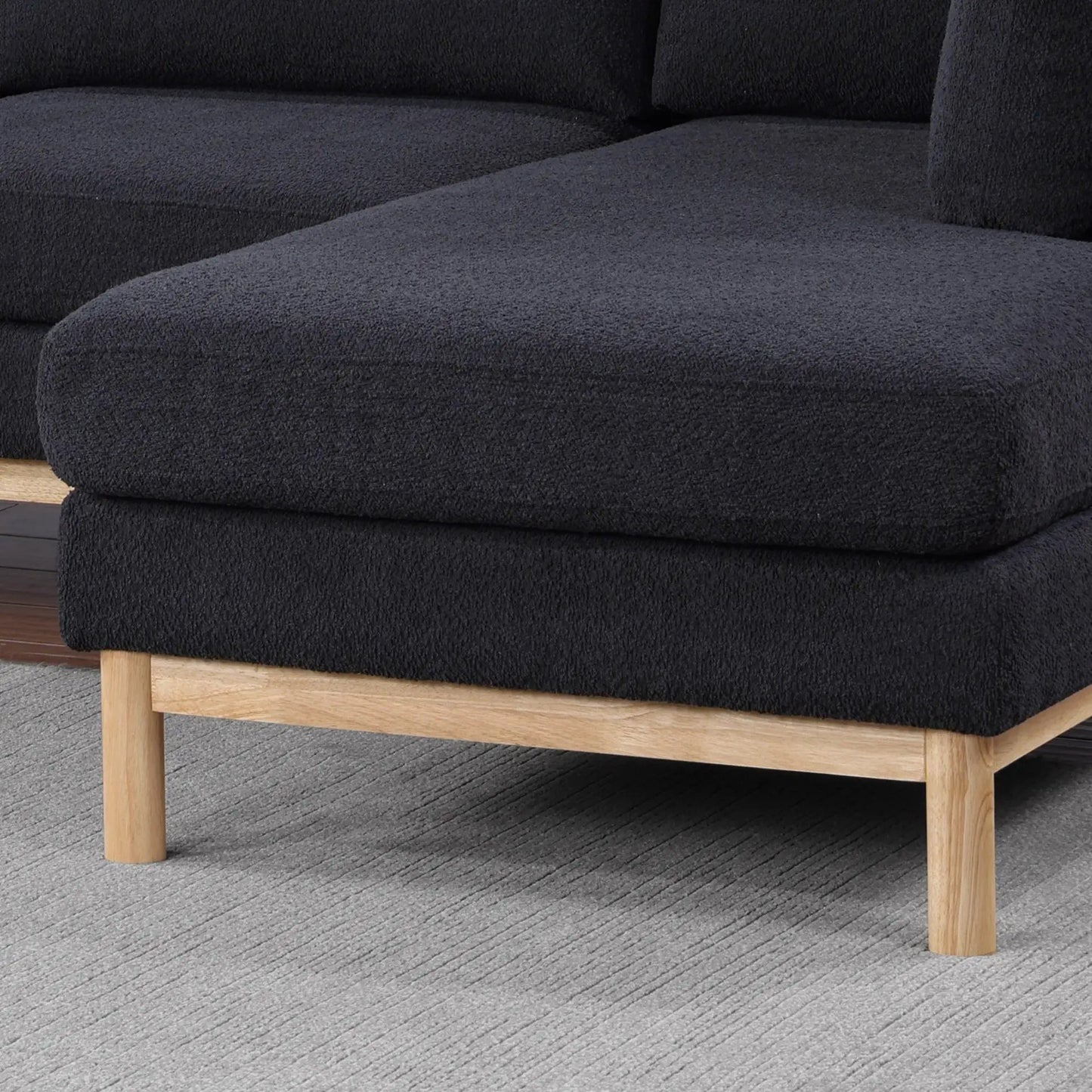 Hallie sherpa chaise sofa in black fabric with wood legs on Tampa Home & Garden Store