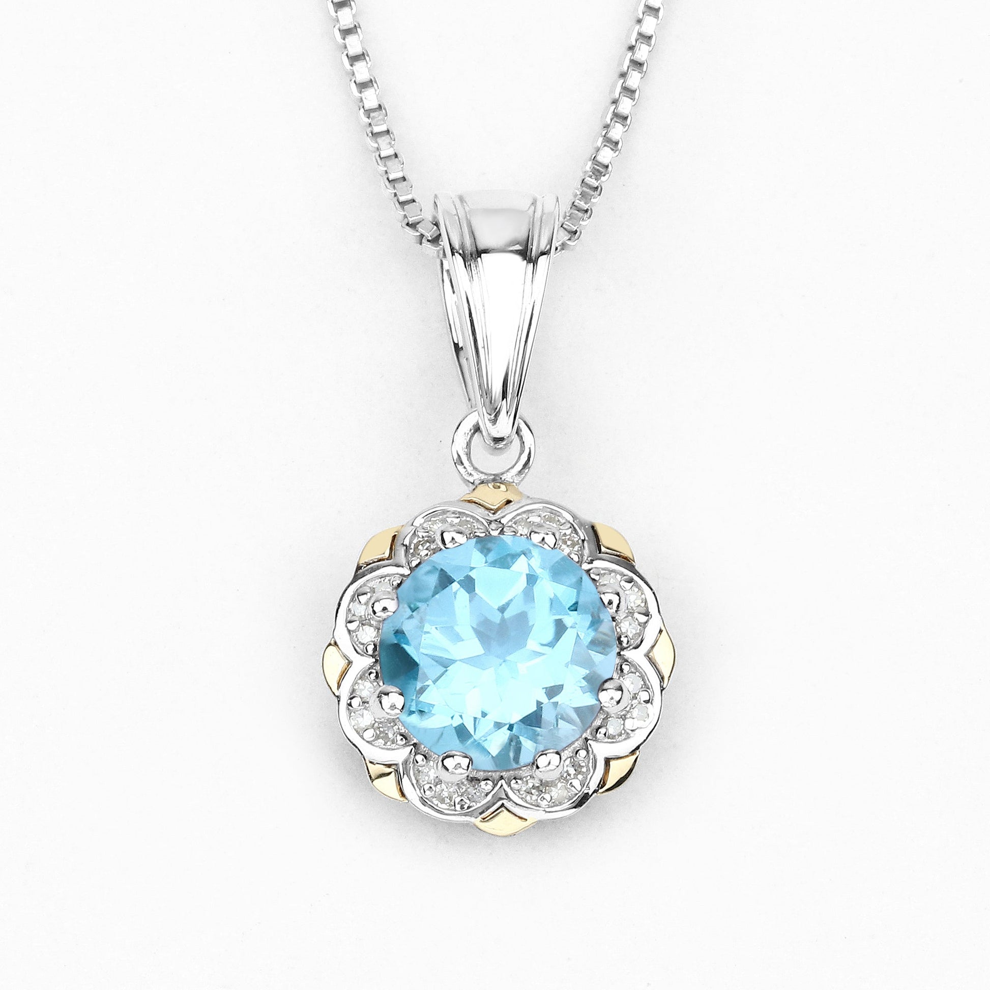 Two-tone pendant with Swiss blue topaz and diamond halo in 14K gold over silver by Bids.com on Tampa Home & Garden Store