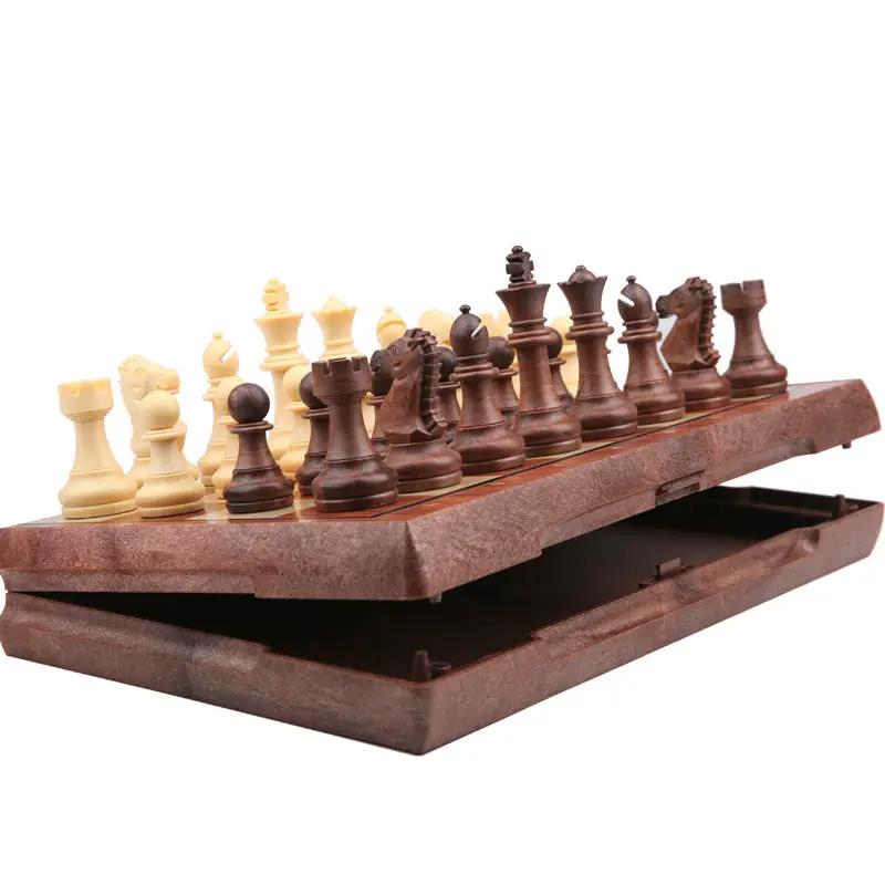 Magnetic chess set with brown and ivory pieces on an imitation solid wood board by FLIPSTYLEZLLC on Tampa Home & Garden Store