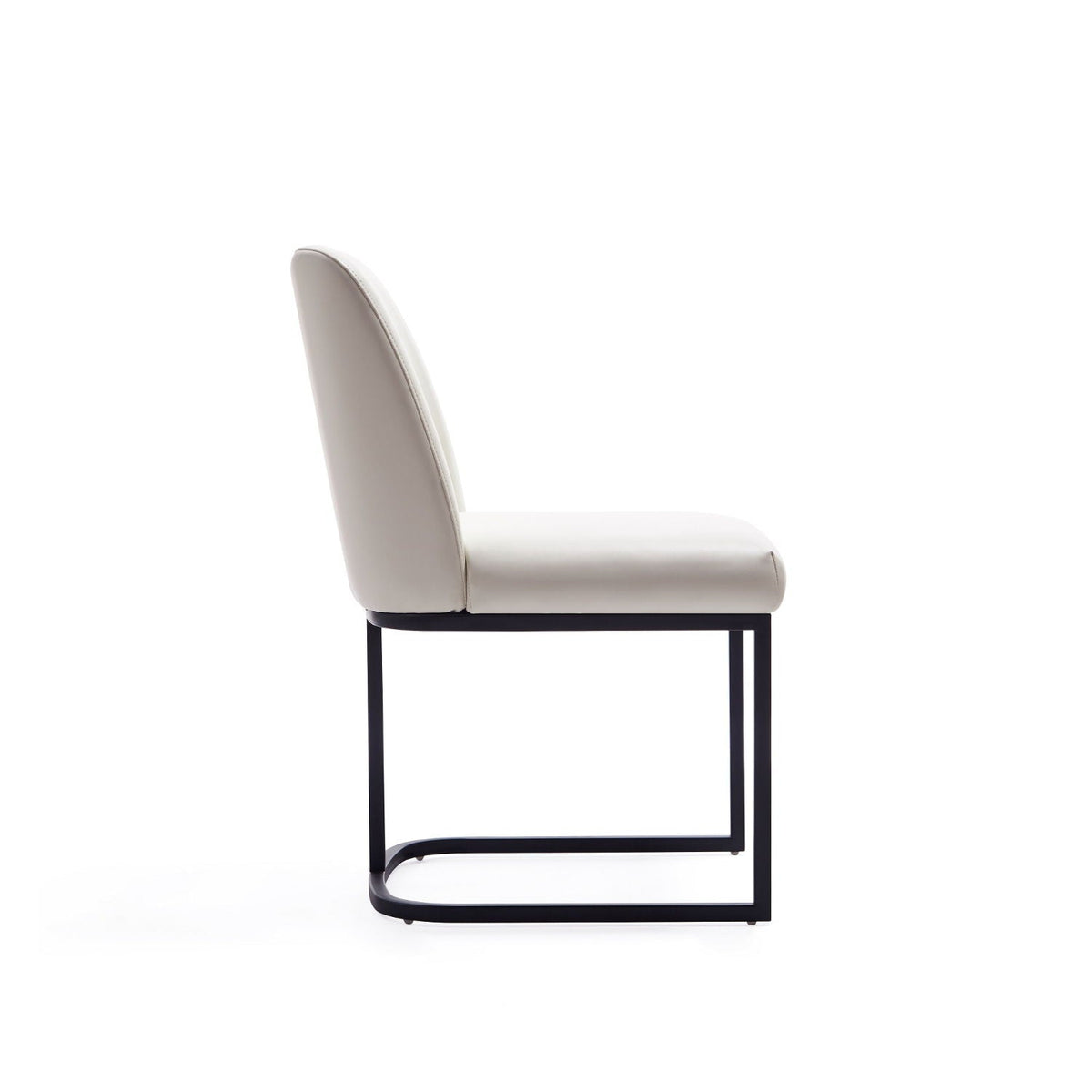 Serena Dining Chair by HouseOfZazla, cream upholstery with geometric black metal base on Tampa Home & Garden Store