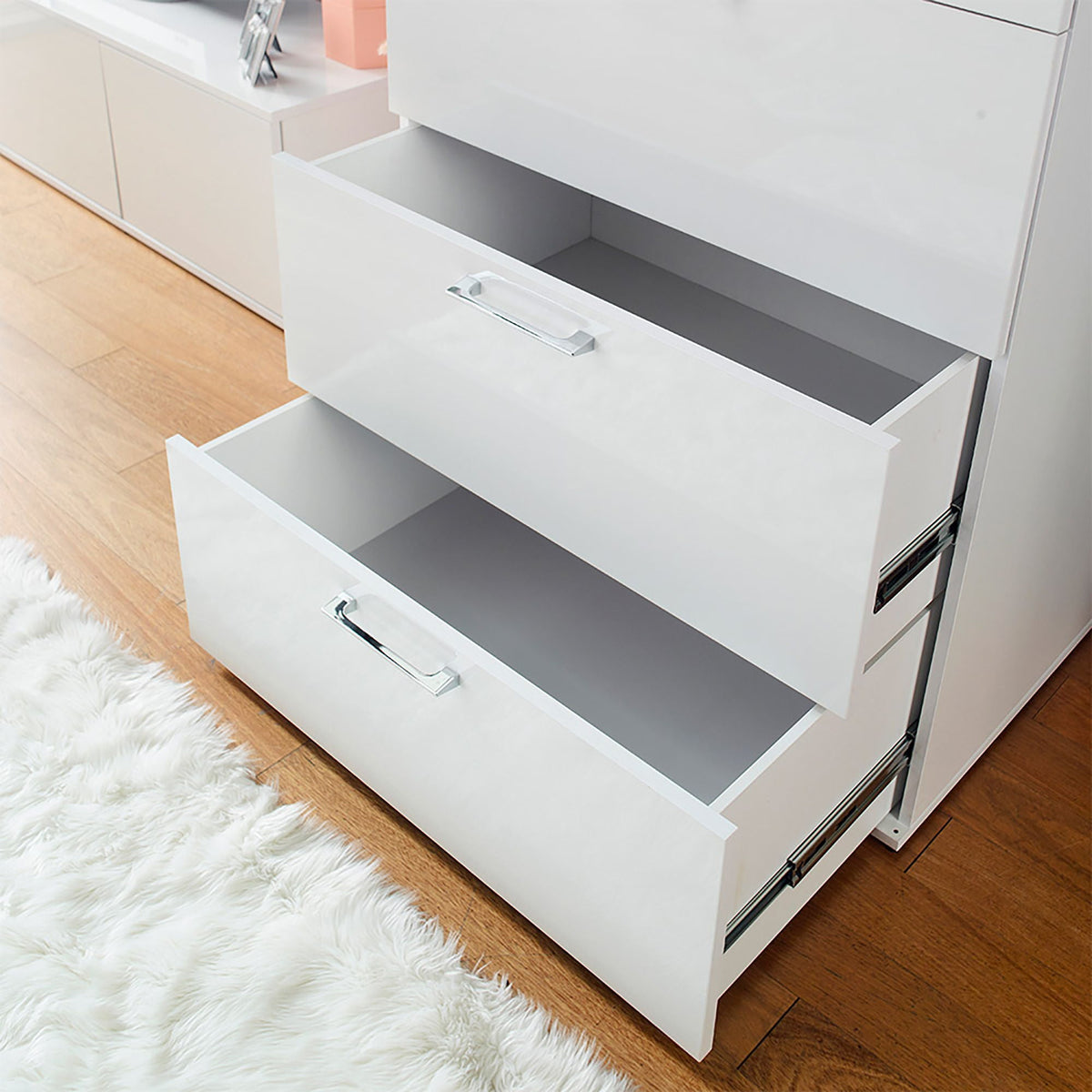 Glossy white 4-drawer accent chest with deep storage, chrome handles on Tampa Home & Garden Store