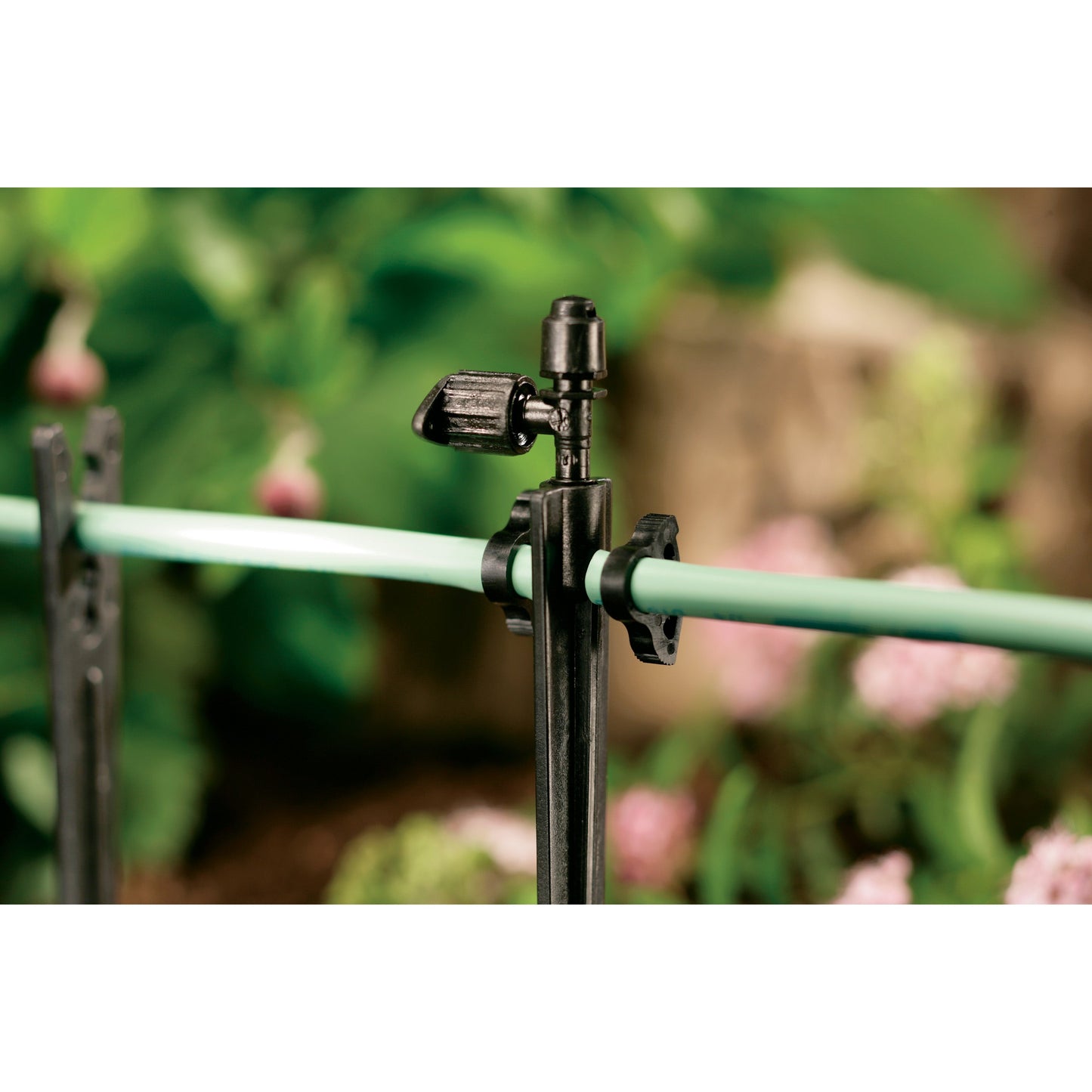 1/4 in Drip Tubing Clamp Orbit Irrigation plastic clamp on tubing on Tampa Home & Garden Store