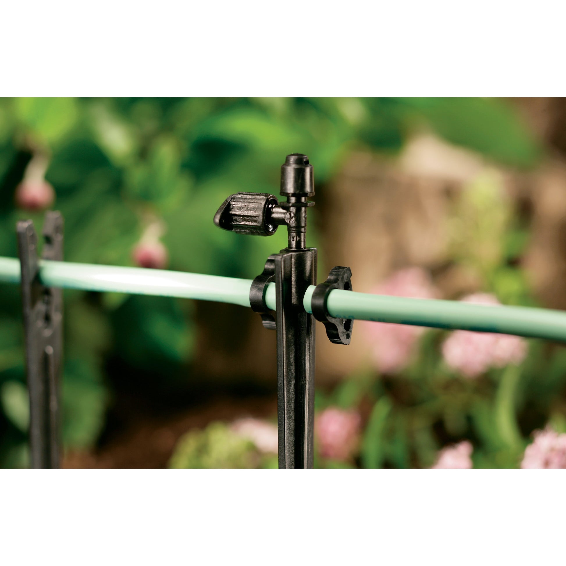1/4 in Drip Tubing Clamp Orbit Irrigation plastic clamp on tubing on Tampa Home & Garden Store