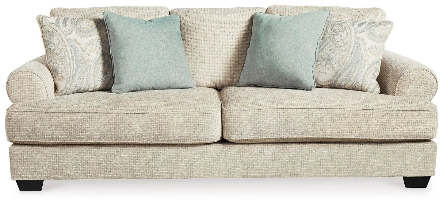 Monaghan Sofa Sandstone stationary sofa with two teal cushions by Unique Piece Furniture on Tampa Home & Garden Store