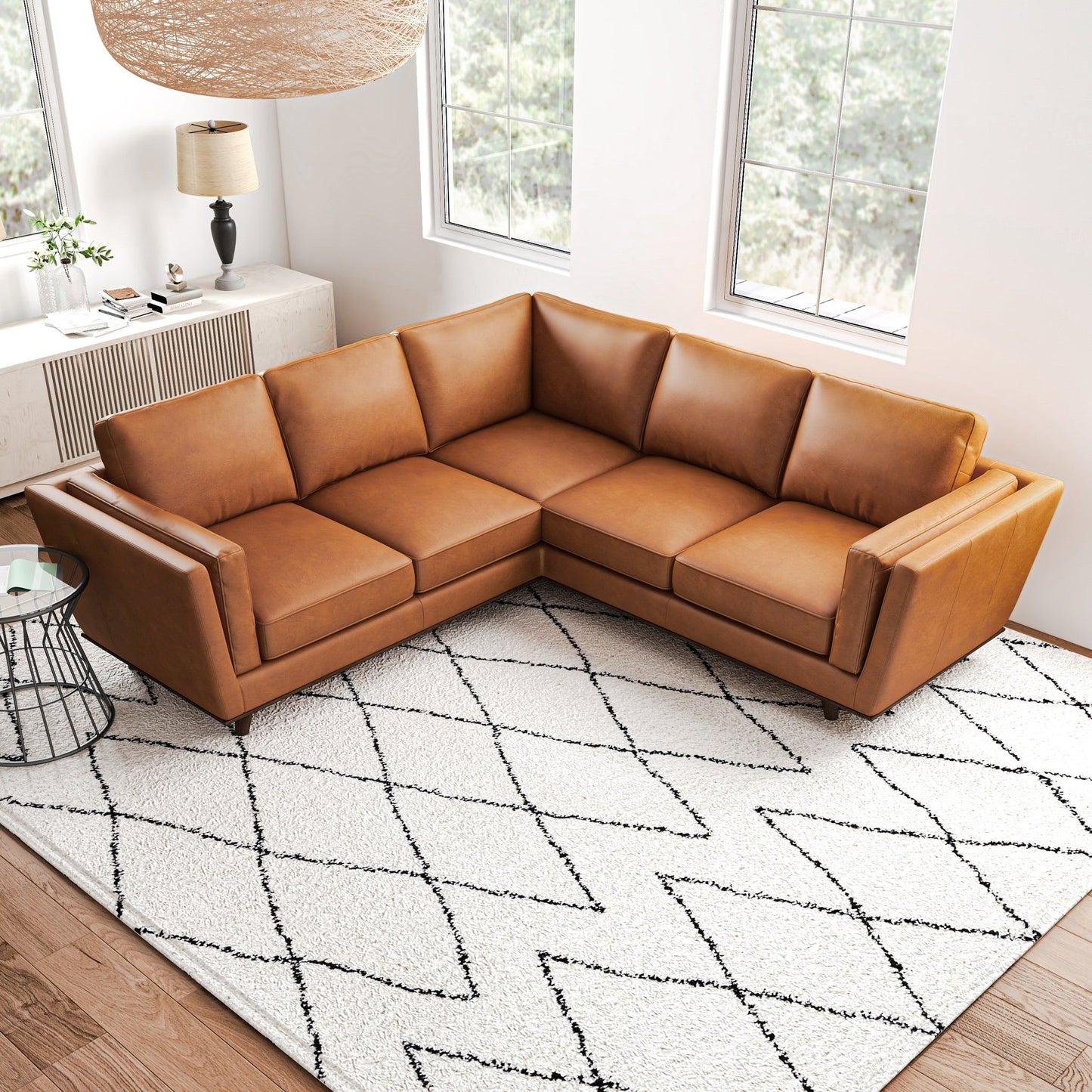 Erman Corner Sofa tan leather sectional by HouseOfZazla in a bright living room on Tampa Home & Garden Store